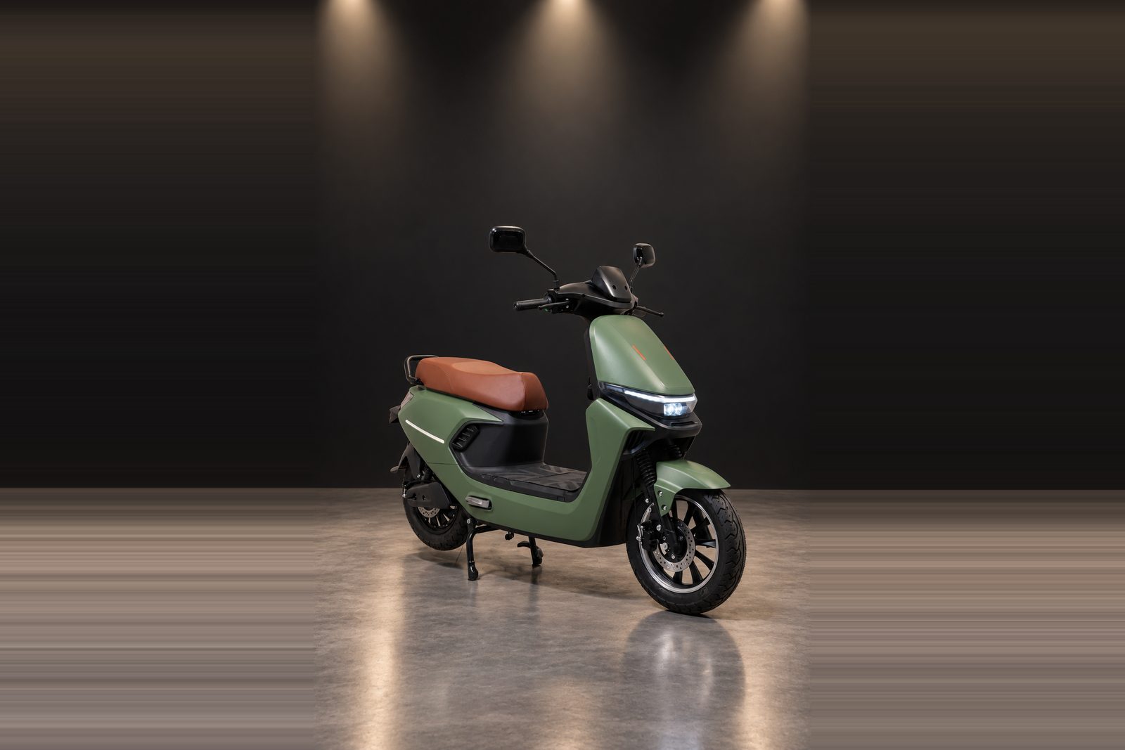 A BNWIE electric scooter in green, seen from the front three-quarter