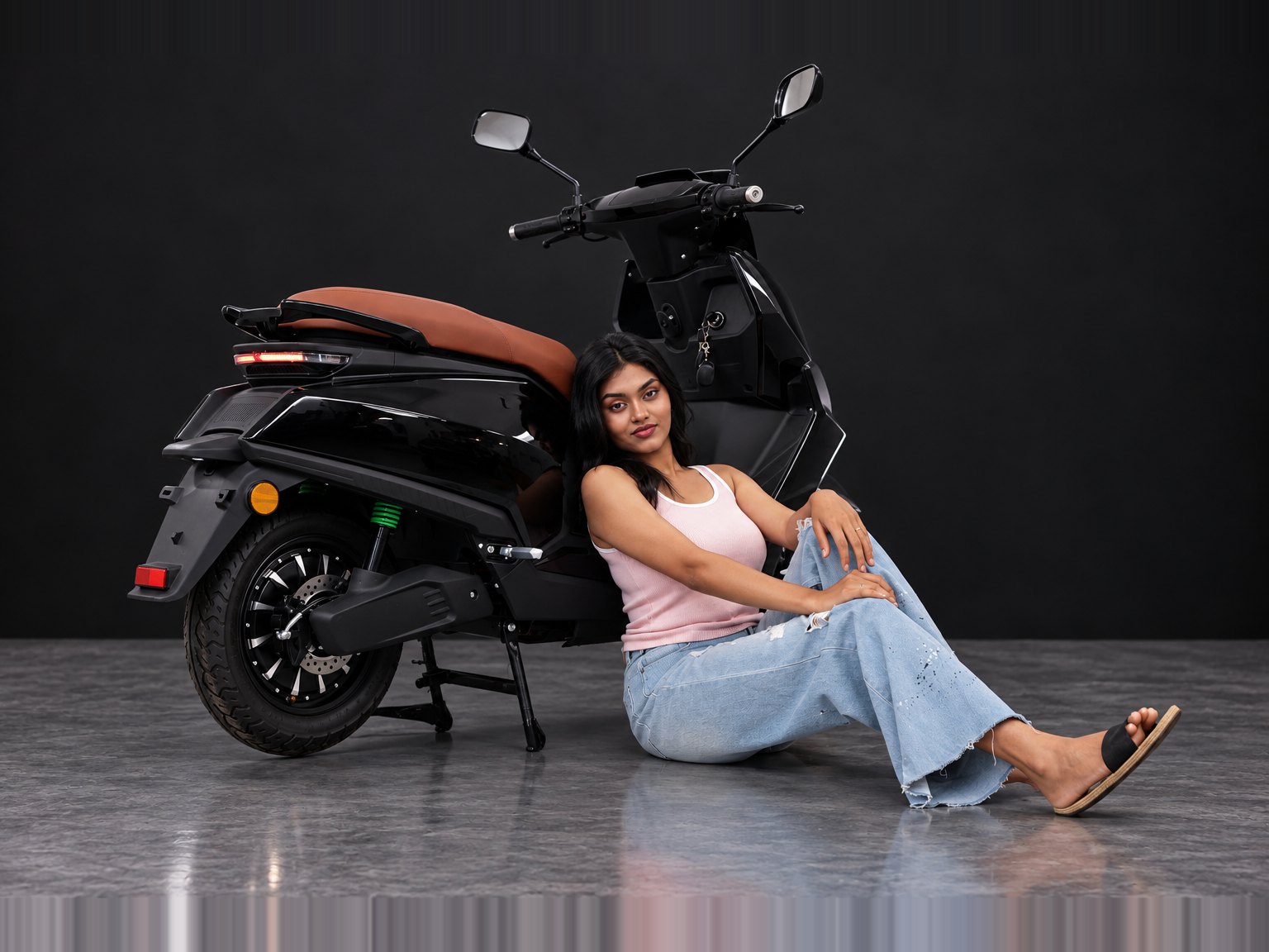 M3 in Black, rear three-quarter view with rider