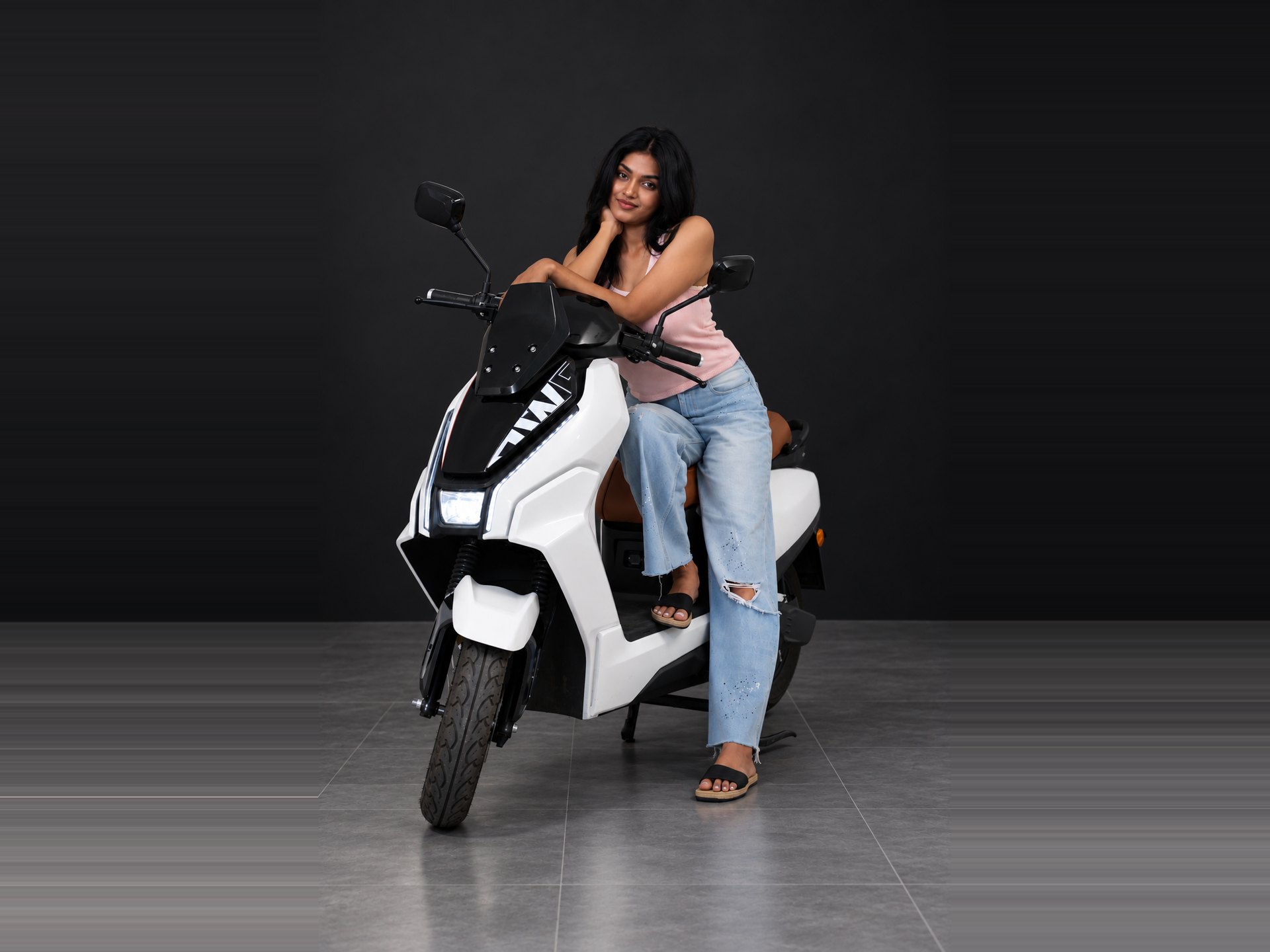 M3 in White, angled view with rider