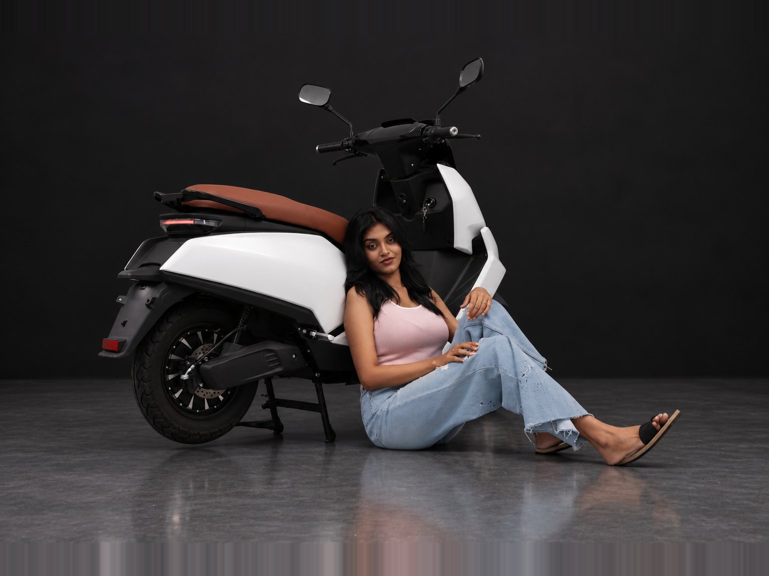 M3 in White, rear three-quarter view with rider