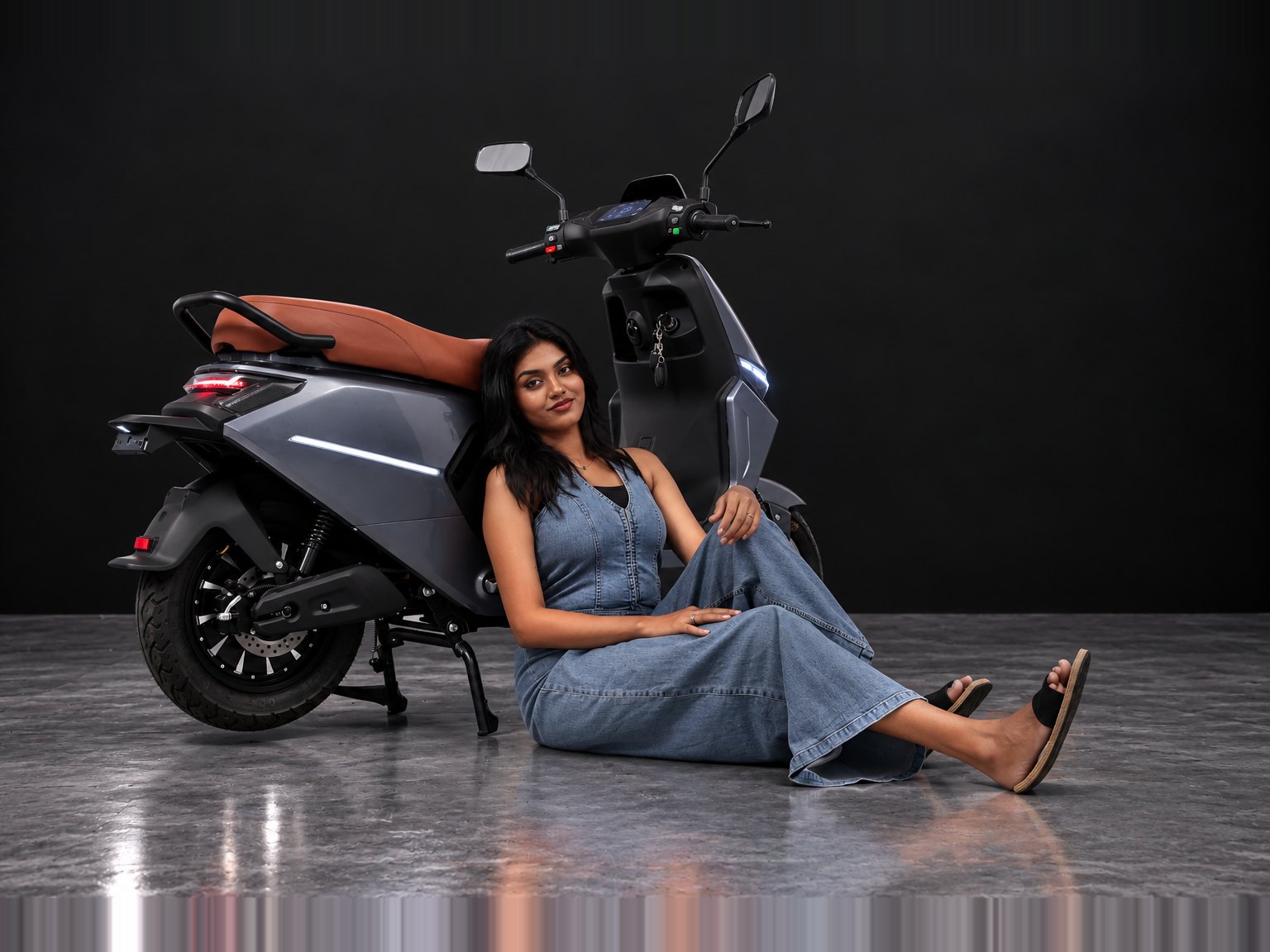 M2 in Grey, rear three-quarter view with rider